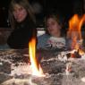 LANI and KAREN enjoying the fireplace.