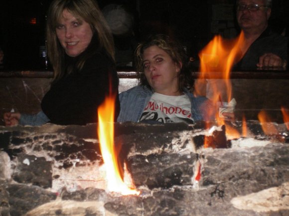 LANI and KAREN enjoying the fireplace.