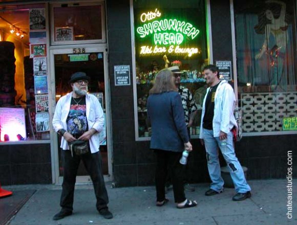 Mr. WOOD and members of ROMAN & THE HEARD relax before THE HEARD's set.