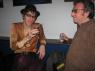 JOSH LEE HOKER (HEADLESS HOOKERS) and friend relax after his set.