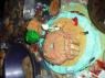 The OTTO's SHRUNKEN HEAD Holiday cake created by THE MIGHTY AFRODITE!