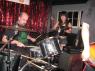 JOEL GAUSTEN (old UNDEAD drummer) sits in on RATTFINK while HITOMI sings back-up vocals.