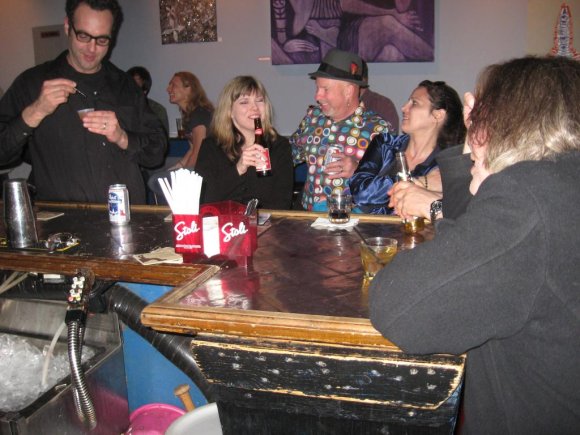 RICHIE HEAVEN (one of the featured artisits) working on a jello shot while his wife, LANI FORD (STARK) enjoys a laugh with BILL 