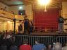 ROCCO MURDER and BIG RON await as TIBERIOUS approaches the ring.