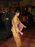 RENA dances into the crowd while playing traditional Japanes castanets.