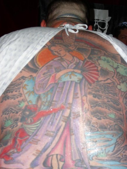 SUNNYSIDE's back tattoo