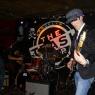 Mike fixing the cymbal while SEAN and BLAZE play on.