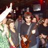 JOHN makes his way back to the stage after his foray into the crowd while RACHAEL looks over his left shoulder.