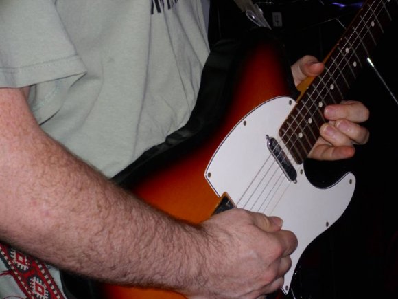 T. J. JORDAN and his guitar.