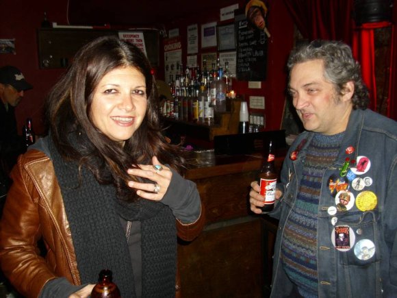 DAVA SHEWOLF (CYCLE SLUTS FROM HELL, SHEWOLVES) shares a laugh with CRAZY GLENN WERNIG (NY WASTE)