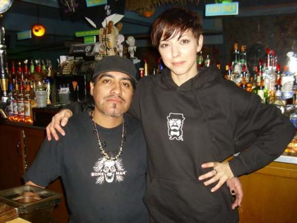 OTTO's Barback, ALBERTO, with OTTO's Bartender, LINDSEY, as she models her new WOODIE HOODIE!