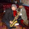 DANNY RAY (MAD JUANA), and CHUCK "RAVEN" HANCOCK get ready to join KING BEE & THE STINGERS for a song.