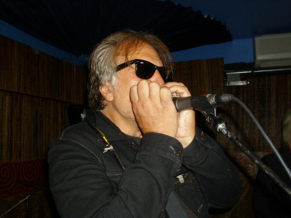 JOE takes a shot at playing the harmonica!