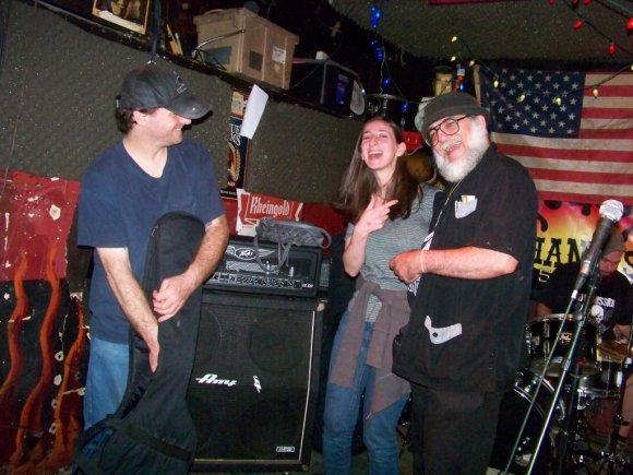 ROMEO and BIG BILL share a laugh with Mr. WOOD.