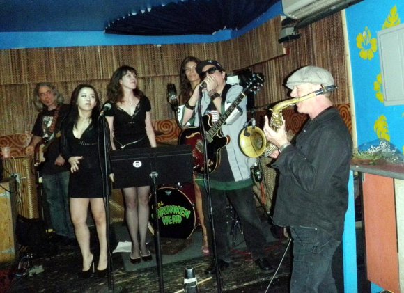 T. J., STELLA, CHRISTA, DAWN and DANNY RAY watch as KENN blows the harmonica!