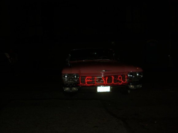 A pink 1959 CADILLAC at the INDIAN LARRY MEMORIAL in Brooklyn during the day (and early night)!