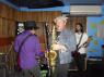 DANNY RAY brings his sax to join THE PURPLEHEARTS for a song.