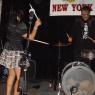 TANIA hitting the cymbals while GREG plays the drums!