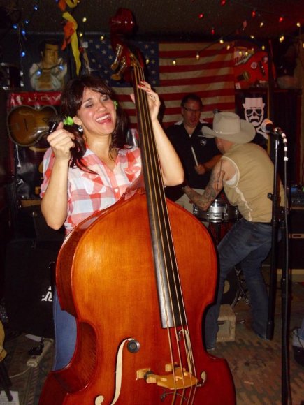 TANIA plays the bass while FIDDLES helps GREG with the drums!