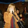 LISA plays harmonica as SUSAN and BABS play in the background!