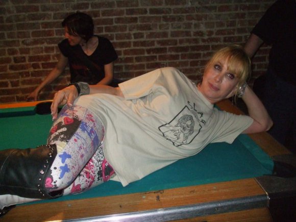 CYNDI lounging about on the pool table trying to get lucky!