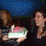 CYNDI holds the cake as ZOE prepares to blow out the candles!