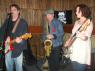 TIM and NORA are joined by DANNY RAY and his sax!