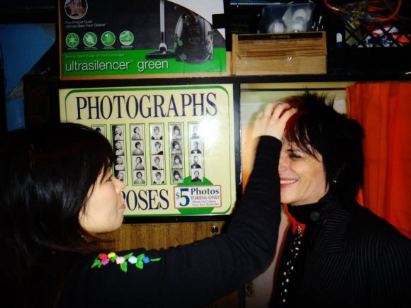 MAKI touches up DANNY's hair before he hits the stage!