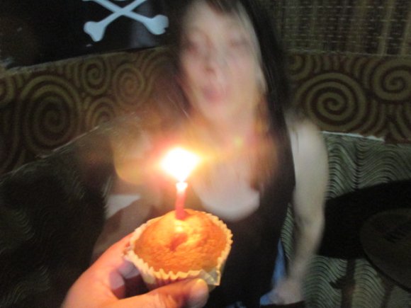 JEANNE about to blow out the candle on her Birthday Cupcake!