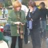 JANE showing off Grandkid's photo to MARTHA!