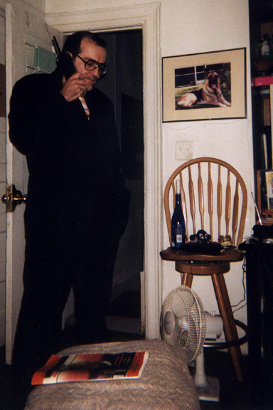 At home on the phone.